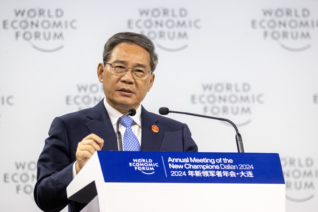Andrzej Duda, President of Poland; Klaus Schwab, Founder and Executive Chairman, World Economic Forum; Li Qiang, Premier of the People's Republic of China; Pham Minh Chinh, Prime Minister of Viet Nam; speaking in the Opening Plenary session at the Annual Meeting of the New Champions 2024 in Dalian, People's Republic of China, 25 June 2024. Dalian International Conference Center - ROOM. Copyright: World Economic Forum / Benedikt von Loebell