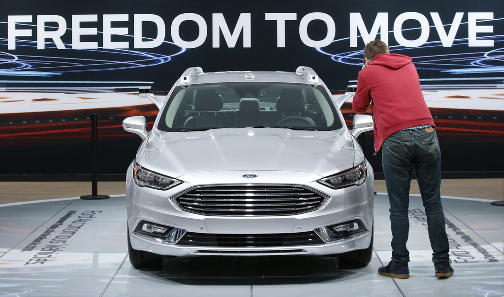 A Ford Fusion Titanium Hybrid autonomous car is displayed during the North American International Auto Show in Detroit, Michigan, U.S., January 10, 2017. REUTERS/Brendan McDermid - RTX2YCHS
