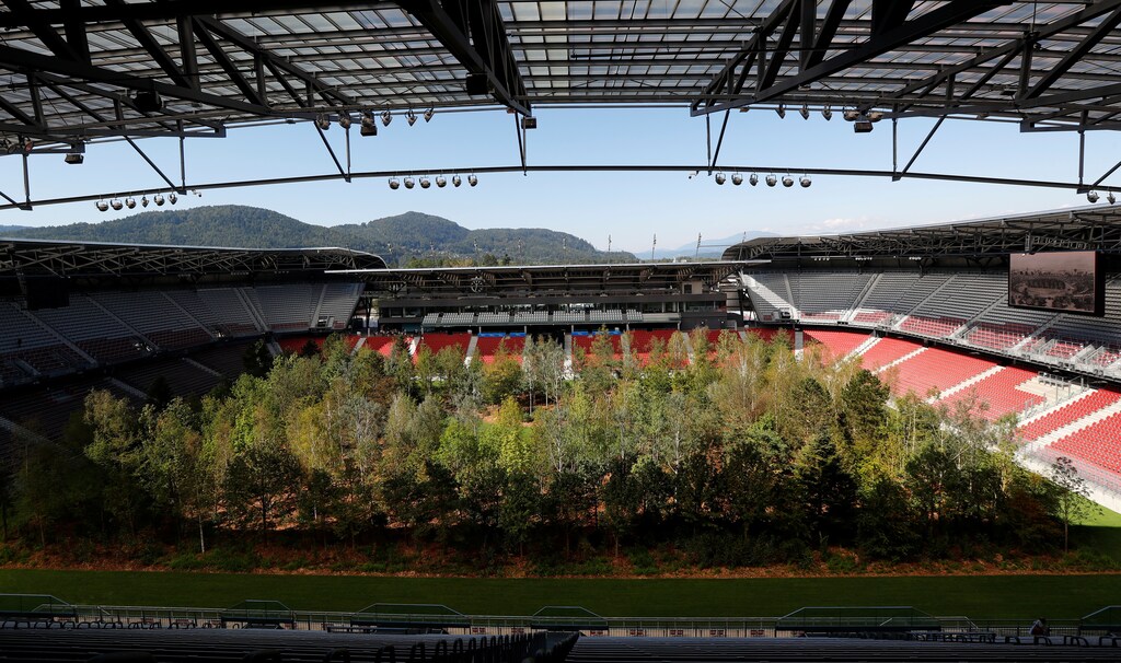 The temporary art intervention by Swiss artist Klaus Littmann "FOR FOREST The Unending Attraction of Nature" is seen on the Woerthersee Stadium in Klagenfurt, Austria September 5, 2019. REUTERS/Leonhard Foeger - RC1C6C52A5B0