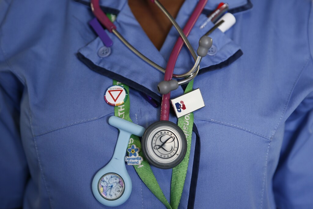 A nurse wears a watch and stethoscope at St Thomas' Hospital in central London January 28, 2015. Dearly-loved and overburdened, Britain's national health system has become the top issue for voters ahead of May's election, after winter brought headlines of ambulances queueing outside hospitals and patients languishing on trolleys for hours.The National Health Service (NHS) delivers care for free to the whole population from cradle to grave and accounts for a third of government spending on public services. Photograph taken January 28, 2015. REUTERS/Stefan Wermuth (BRITAIN - Tags: POLITICS HEALTH ELECTIONS) - LM1EB221CXY01