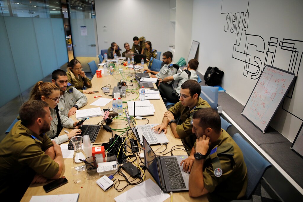 Israeli soldiers take part in a cybersecurity hackathon