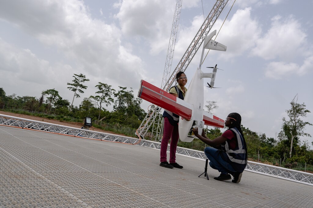 Workers pack a box of vaccines to be delivered by a Zipline drone, in Ghana April 22, 2019.