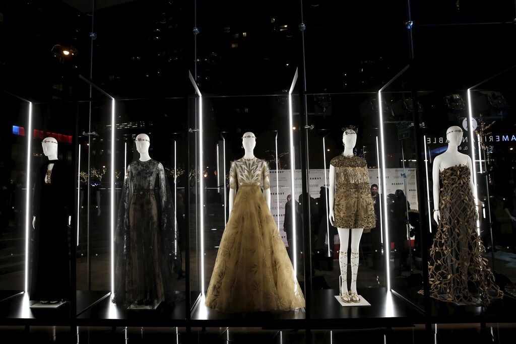 An installation of gowns from Valentino's Mirabilia Romae Fall 2015 Haute Couture collection are seen in a lobby at the "An Evening Honoring Valentino" gala benefiting the Lincoln Center Corporate Fund at Alice Tully Hall at Lincoln Center in the Manhattan borough of New York City, December 7, 2015. The event honored Valentino Creative Directors Maria Grazia Chiuri and Pierpaolo Piccioli. REUTERS/Mike Segar - RTX1XNEF