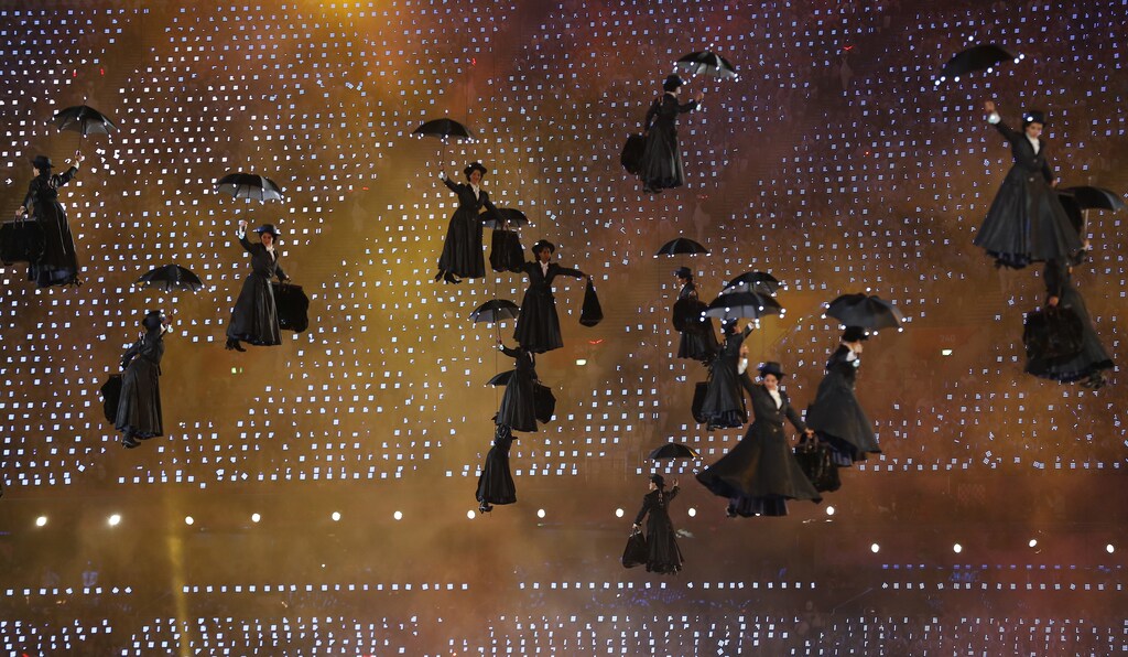 Performers dressed as the character Mary Poppins descend to the ground during the opening ceremony of the London 2012 Olympic Games at the Olympic Stadium July 27, 2012