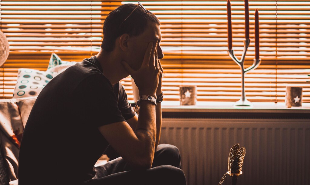 this man is looking stressed and tired. COVID-19 has led to burnout for some parents