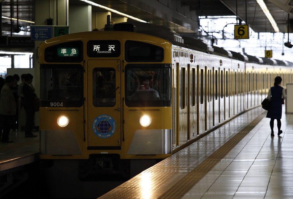 A train of Seibu Railway Co., railway service unit of Seibu Holdings, arrives at a station in Tokyo June 25, 2013. Private equity giant Cerberus Capital Management LP and Japan's Seibu Holdings will square off in a shareholder vote on Tuesday over the U.S. firm's drive to shake up the board and win more influence. REUTERS/Issei Kato (JAPAN - Tags: BUSINESS EMPLOYMENT) - GM1E96P0TEK01