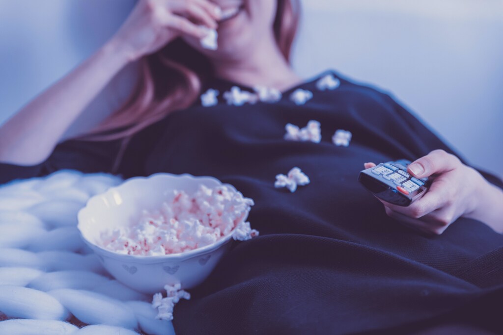watching TV, like this woman here, becomes an addiction when it negatively impacts a person's life