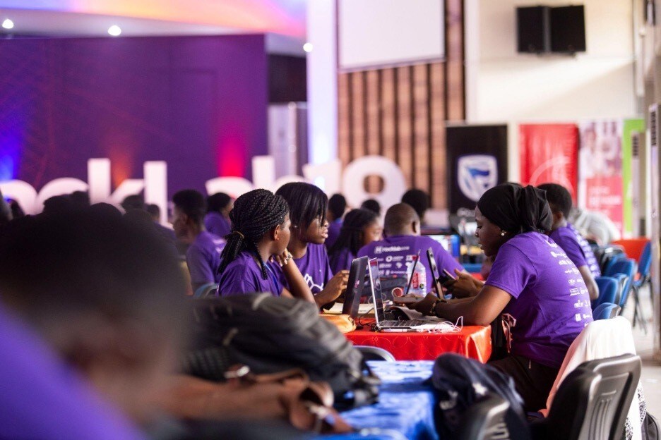 Young Africans using laptops at a Hacklab Foundation event.