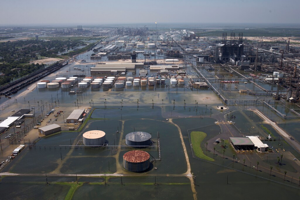 Flood waters caused by Tropical Storm Harvey encompass the Motiva Enterprises LLC in Port Arthur, Texas, U.S. August 31, 2017. REUTERS/Adrees Latif - RC1254851E70