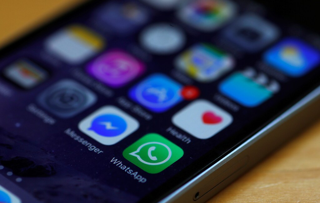 WhatsApp and Facebook messenger icons are seen on an iPhone in Manchester , Britain March 27, 2017. REUTERS/Phil Noble - RTX32Y10