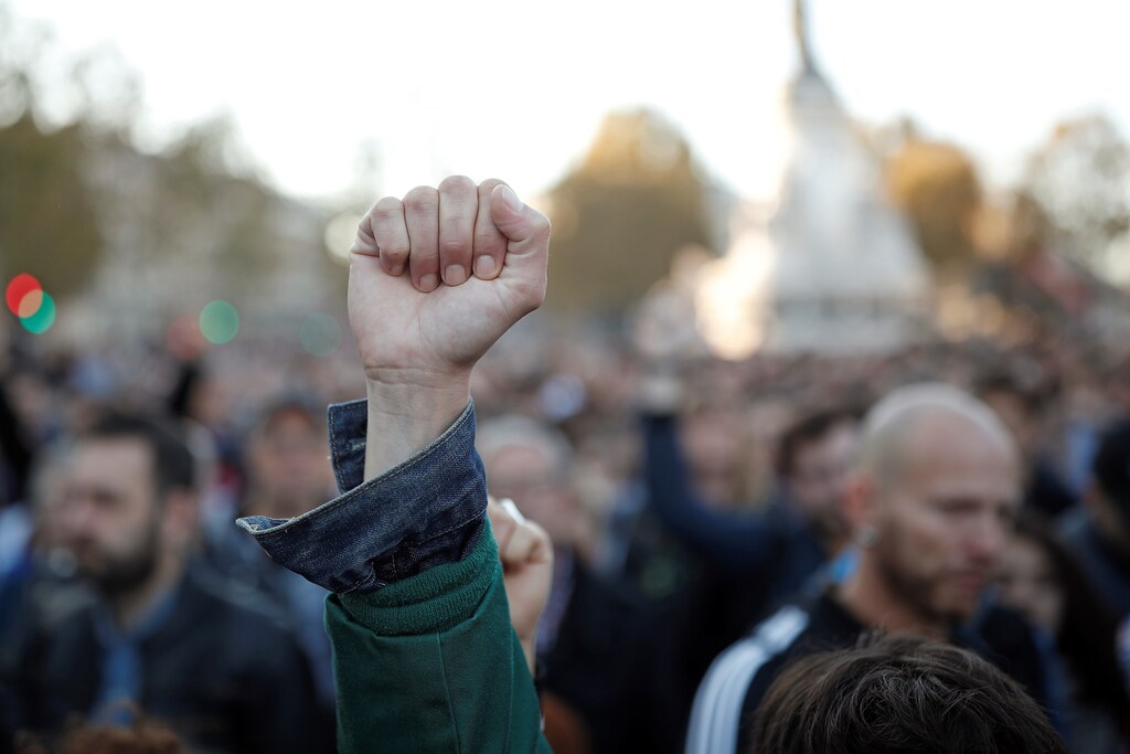 Members and supporters of the lesbian, gay, bisexual and transgender (LGBT) community protest against discrimination and violence, at the Place de la Republique in Paris, France, October 21, 2018. REUTERS/Benoit Tessier - RC1E0D2566E0