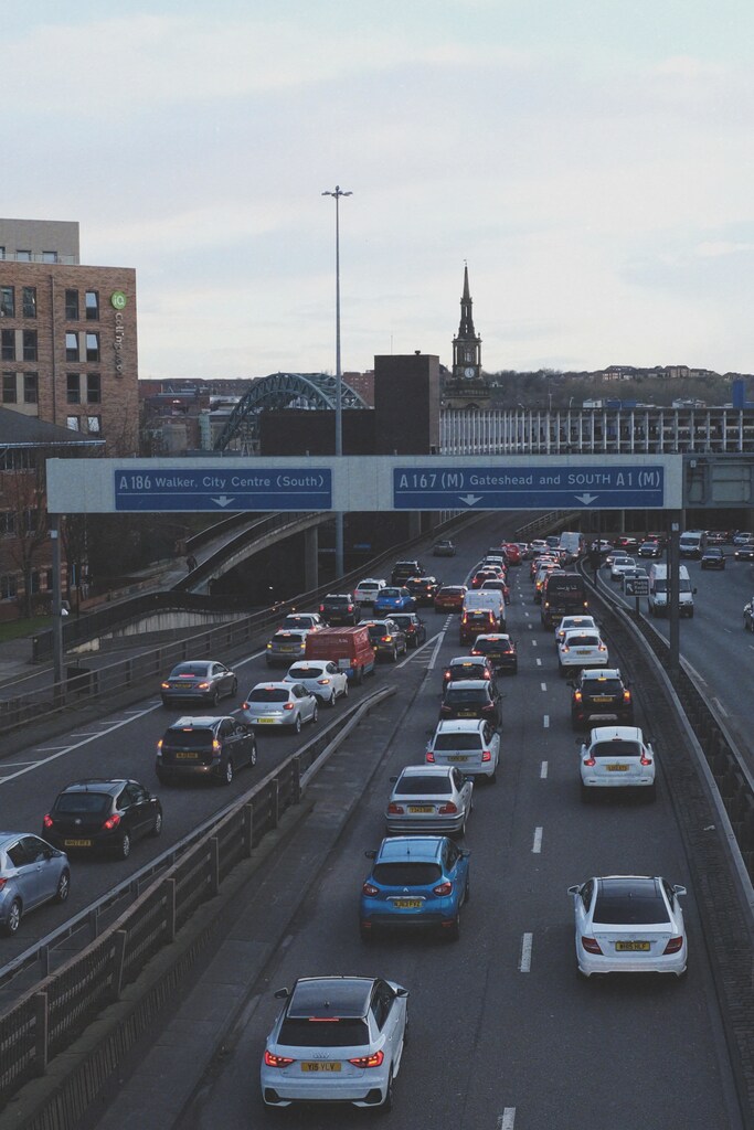 Cars in traffic, attempting to merge onto a motorway