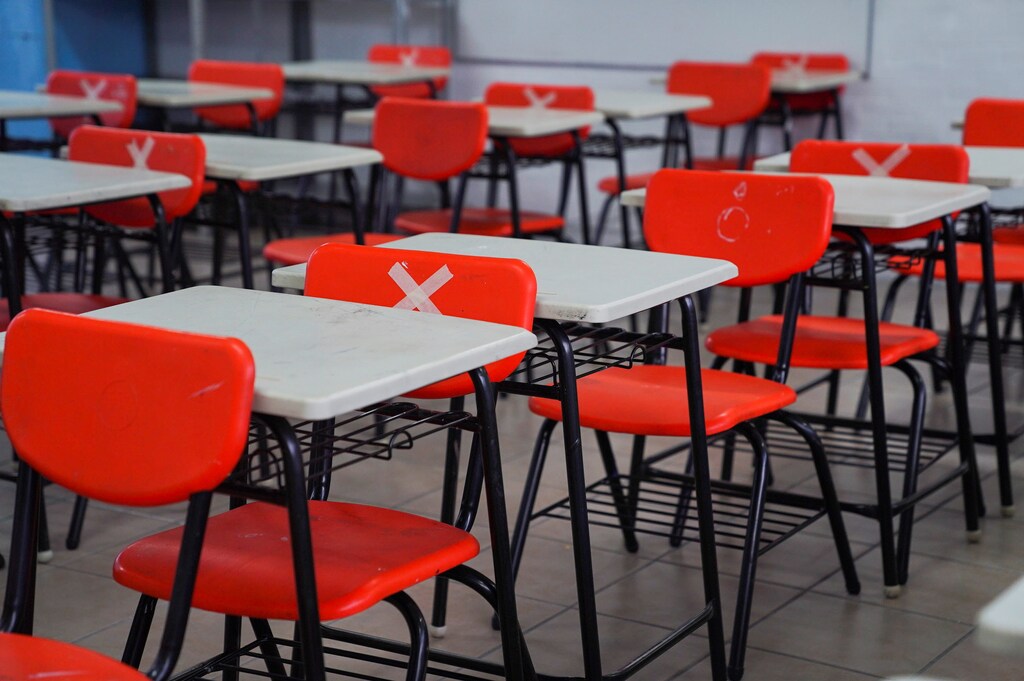 Chairs are marked to aid social distancing in a classroom in the Carlos Pellicer primary school, as in-person classes return after over a year of online lessons as the coronavirus disease (COVID-19) outbreak continues in Mexico City, Mexico, August 30, 2021. REUTERS/Toya Sarno Jordan - RC2PFP9JRVXF