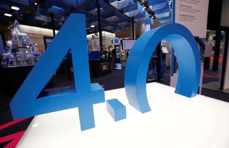 An exhibit symbols the fourth industrial revolution "industry 4.0" during the Hannover Fair in Hanover, Germany, April 25, 2016. REUTERS/Wolfgang Rattay - D1BETHKEVDAB