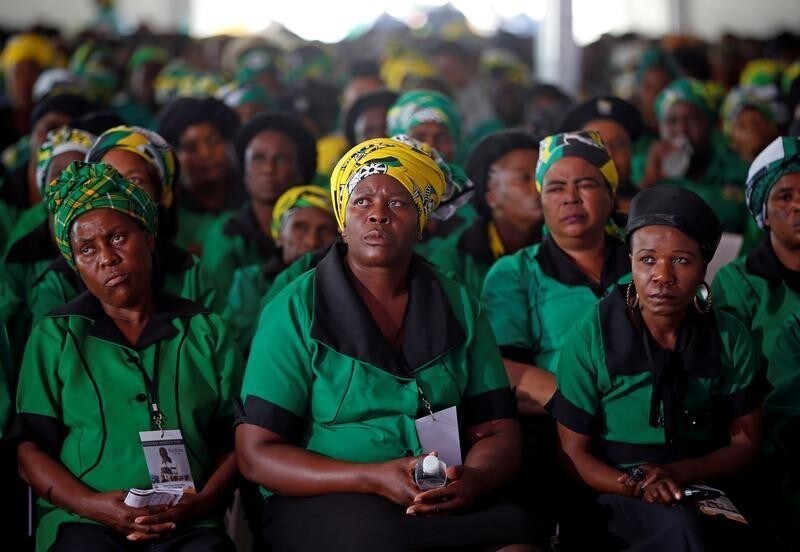 Members of the African National Congress Women's League (ANCWL) attend the funeral of veteran photojournalist Sam Nzima, a South African photographer known for capturing the iconic picture of Hector Peterson on June 16 1976, during the youth uprising in Soweto, in Lillydale, in Mpumalanga province, South Africa May 26, 2018. REUTERS/Siphiwe Sibeko - RC11AC302FB0