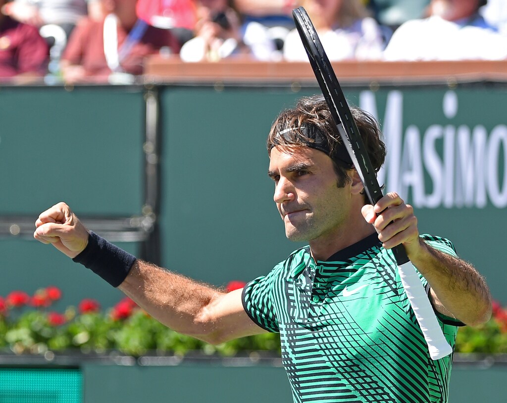 Mar 18, 2017; Indian Wells, CA, USA; Roger Federer (SUI) pumps his fists after defeating Jack Sock (not pictured) 6-1, 7-6 in his semi-final match in the BNP Paribas Open at the Indian Wells Tennis Garden. Mandatory Credit: Jayne Kamin-Oncea-USA TODAY Sports - RTX31NYF