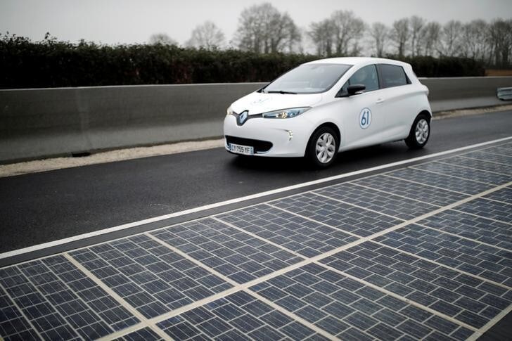 A solar panel road is pictured during its inauguration in Tourouvre, Normandy, northwestern France, December 22, 2016. REUTERS/Benoit Tessier