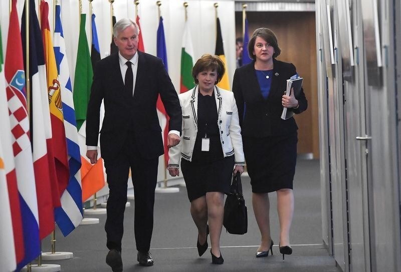 European Union's chief Brexit negotiator Michel Barnier walks with Northern Ireland's Democratic Unionist Party (DUP) leader Arlene Foster and DUP member Diane Dodds prior to a meeting at the EU Commission headquarters in Brussels, Belgium October 9, 2018.