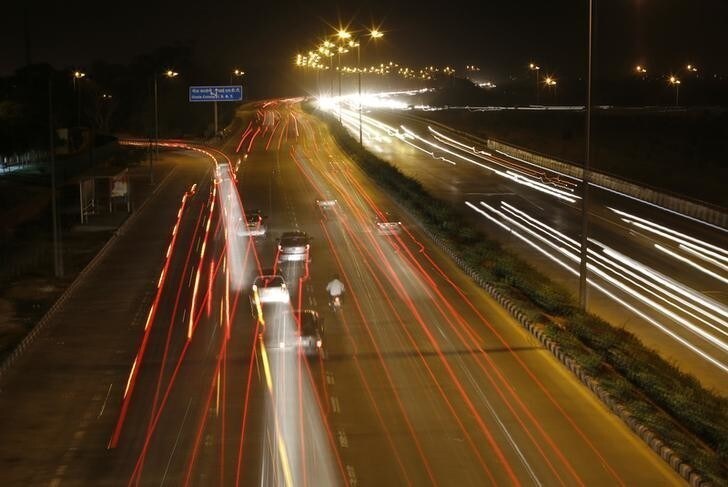 Vehicles drive on a road in New Delhi April 9, 2013. India's annual car sales fell for the first time in a decade in the financial year just ended, official data showed on Wednesday, calling into question bullish growth expectations that fuelled billion-dollar bets from global manufacturers. Picture taken on slow shutter speed. Picture taken April 9, 2013. REUTERS/Adnan Abidi (INDIA - Tags: TRANSPORT BUSINESS)