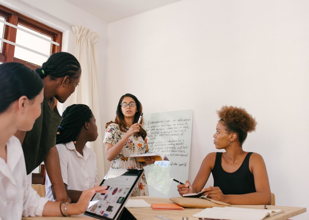 People discussing work in an office environment