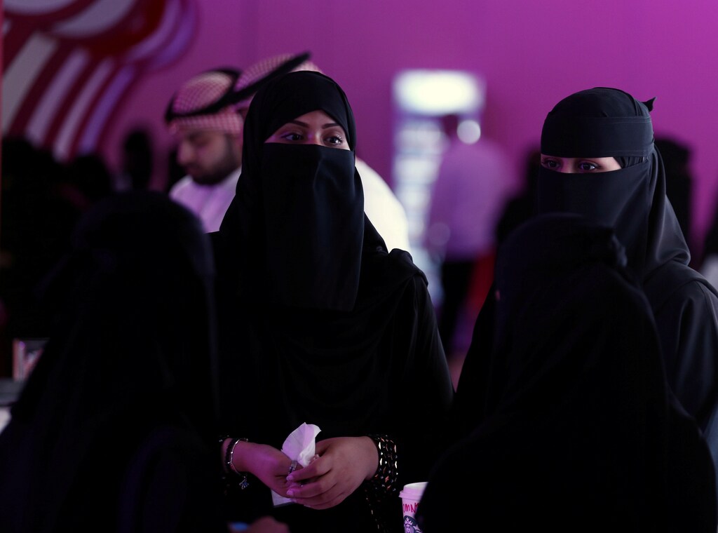 Saudi students stand at the exhibition to guide job seekers at Glowork Women's Career Fair in Riyadh, Saudi Arabia October 2, 2018. REUTERS/Faisal Al Nasser - RC1592E444A0
