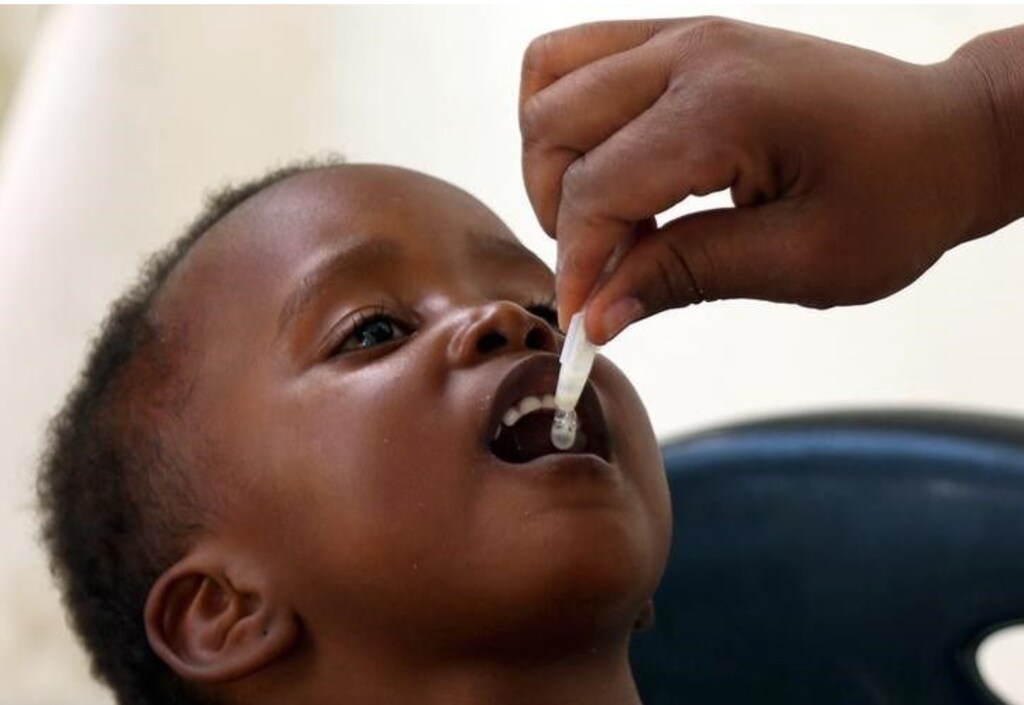 A child receives a cholera vaccination at a clinic in Harare, Zimbabwe