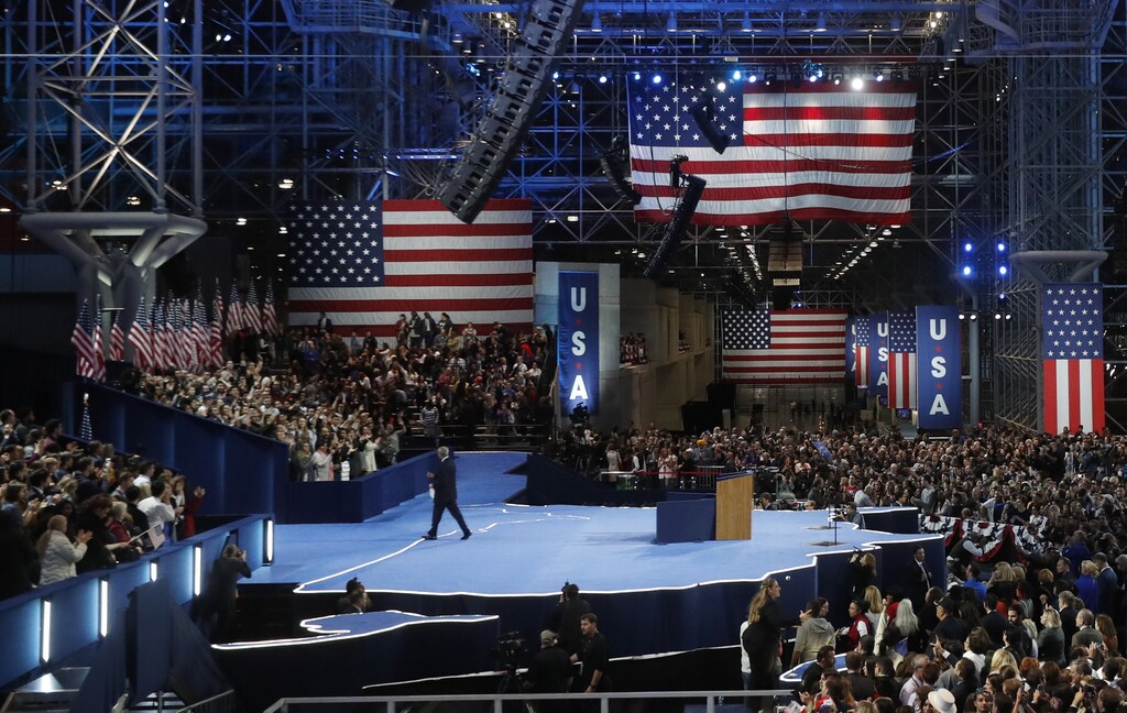 U.S. Democratic presidential nominee Hillary Clinton's campaign chairman John Podesta walks off the stage after addressing supporters at the election night rally in New York, U.S., November 9, 2016. REUTERS/Rick Wilking - RTX2SPJ2