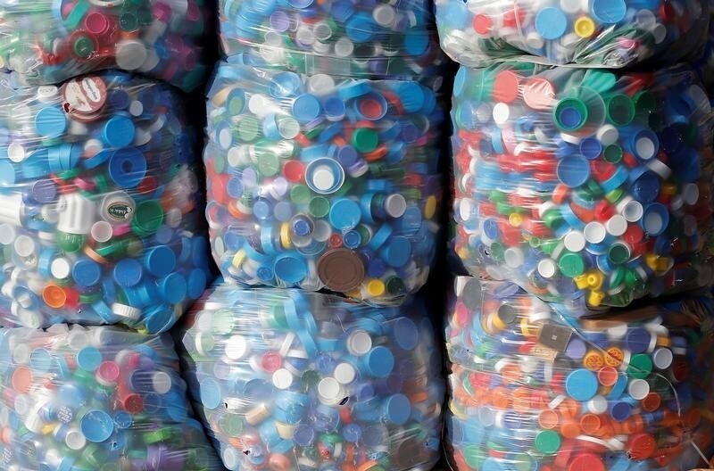 Bags filled with caps are pictured at the Association Bouchon d'Amour which collects and recycles plastic caps in Martignas-Sur-Jalles near Bordeaux, France, November 23, 2018. REUTERS/Regis Duvignau - RC17D4709770