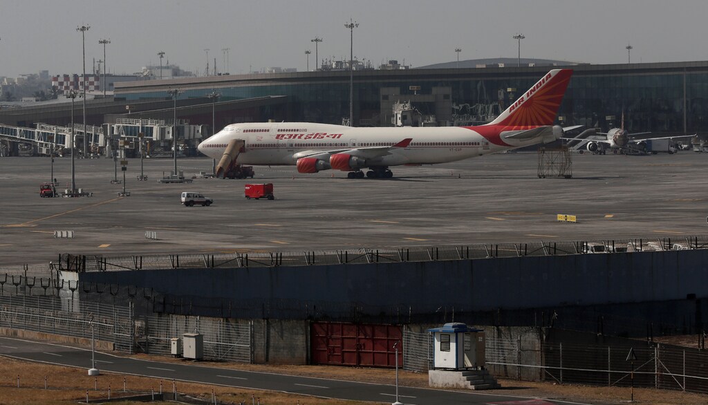 An Air India Boeing 747-400 aircraft is seen parked on the tarmac at Chhatrapati Shivaji Maharaj International Airport in Mumbai, India, January 30, 2020. REUTERS/Francis Mascarenhas - RC2BQE94CGUH