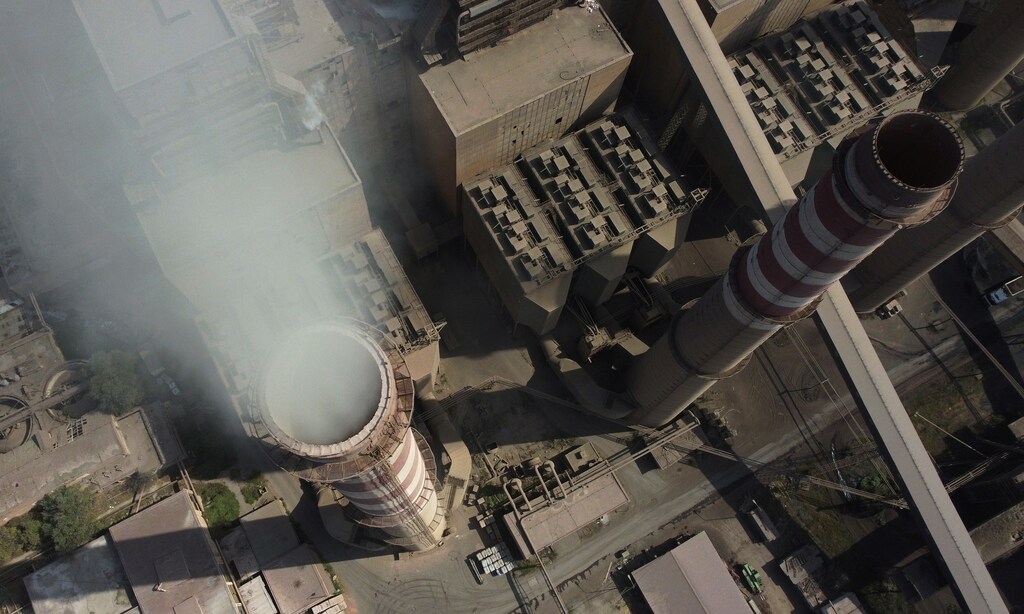 Smoke rises from the chimneys of the Kosova A coal-fired power plant in the town of Obilic, Kosovo September 10, 2021. Picture taken September 10, 2021. Picture taken with a drone. REUTERS/Fatos Bytyci