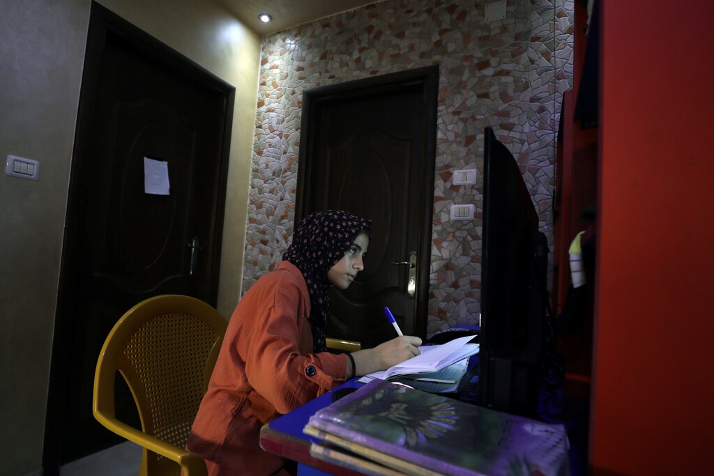 Palestinian student Raseel Hussein attends an online lesson in her family home, amid the coronavirus disease (COVID-19) outbreak, in Gaza City September 22, 2020. Picture taken September 22, 2020.