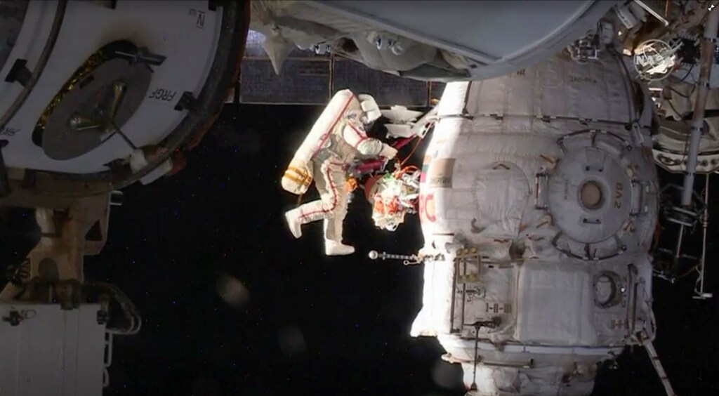 Russian cosmonaut Oleg Kononenko conducts a spacewalk outside the International Space Station Space (ISS) in this still image captured from NASA video in space, December 11, 2018. Courtesy NASA TV/Handout via REUTERS ATTENTION EDITORS - THIS IMAGE HAS BEEN SUPPLIED BY A THIRD PARTY. TPX IMAGES OF THE DAY - RC13DD990970