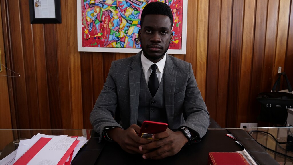 Claudio Kiala, a local entrepreneur and innovator who developed a performance platform known as Soba Channel App, poses for a photograph at his office, amid the coronavirus disease (COVID-19) outbreak, in Luanda, Angola, June 17, 2020. Picture taken June 17, 2020. REUTERS/Lee Bogata - RC2NLH9C0DK0