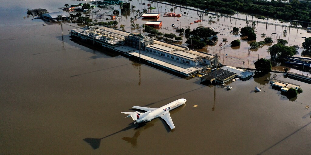 A drone shot shows a cargo plane at the flooded Salgado Filho International Airport in Porto Alegre in Rio Grande do Sul, Brazil, May 7, 2024. Climate resilience is quickly becoming a business imperative for airports around the world.