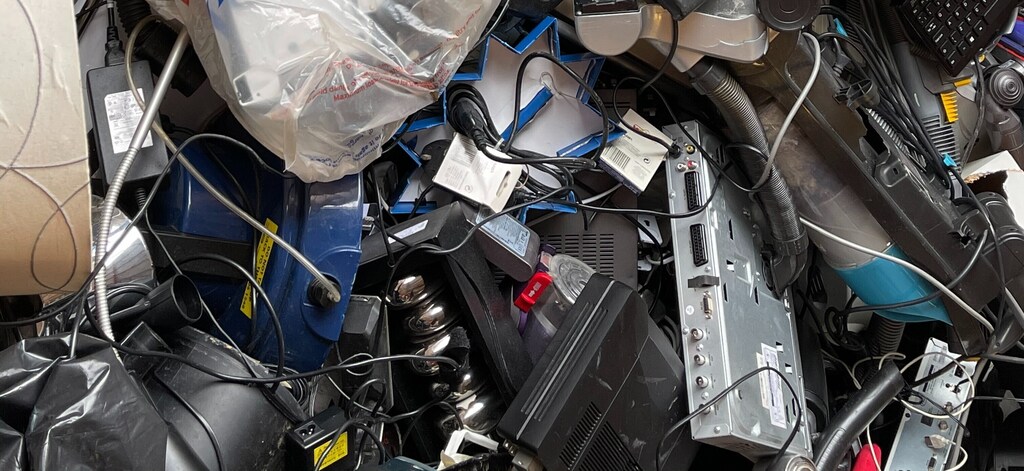Domestic appliance e-waste being recycled.