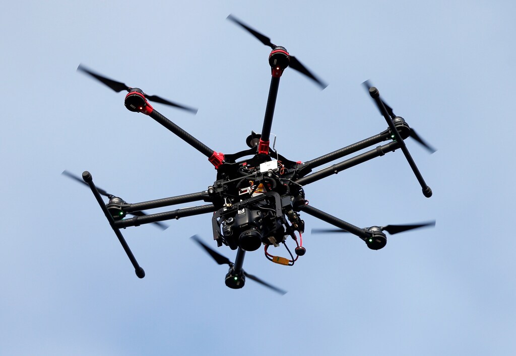 A drone flies as Belgian police officers showcase the use of drones deployed over traffic accidents occurring on highways, in Ranst near Antwerp, Belgium, January 18, 2017. REUTERS/Francois Lenoir - RTSW2DH