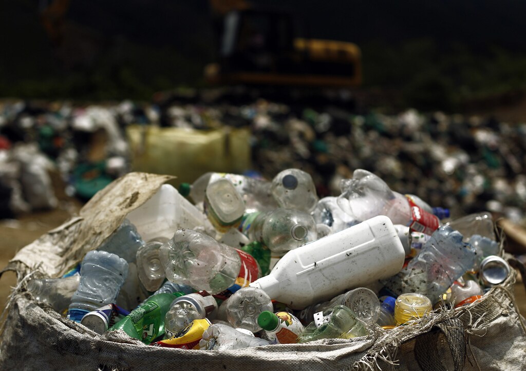 A bag full of empty plastic bottles to be recycled is seen at a dumpsite in Garabito, 113 km (70 miles) from San Jose, June 1, 2012. According to the Association Terranostra, Costa Rica produces 4,500 metric tons of garbage every day that ends up on beaches and in the ocean. More than five hundred volunteers participated in the cleaning operation at 25 sites around the country as part of commemorative events for the United Nations' World Environment Day to be marked on June 5. REUTERS/Juan Carlos Ulate (COSTA RICA - Tags: ENVIRONMENT SOCIETY) - RTR32YVX