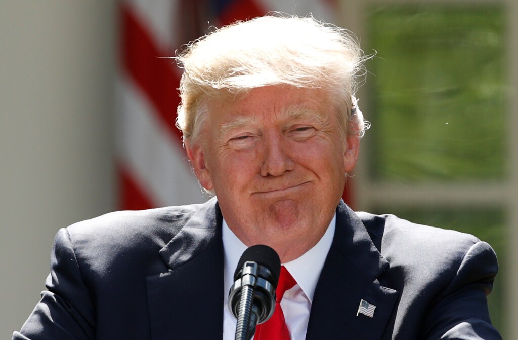 US President Donald Trump pauses as he announces his decision that the United States will withdraw from the landmark Paris Climate Agreement, in the Rose Garden of the White House, June 1, 2017