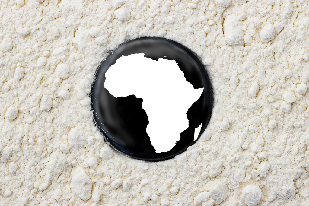 A black disk with a white image of Africa: We need to reimagine funding models to build Africa's AI future.