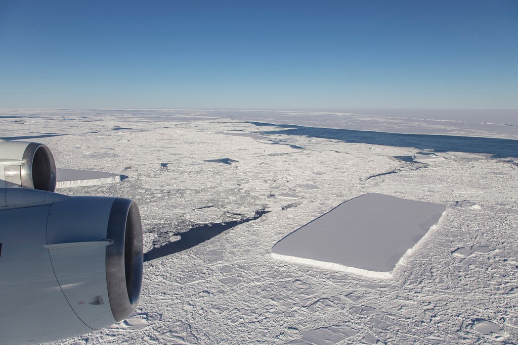 A sharp-angled, tabular iceberg floats among sea ice just off of the Larsen C ice shelf in the northern Antarctic Peninsula, October 16, 2018. Picture taken October 16, 2018. NASA/Jeremy Harbeck/Handout via REUTERS ATTENTION EDITORS - THIS IMAGE WAS PROVIDED BY A THIRD PARTY. - RC122E9ADA00