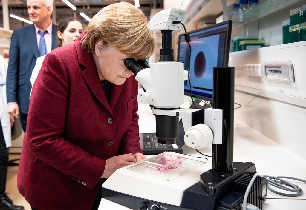 German Chancellor Angela Merkel visits a new molecular medicine research building.
