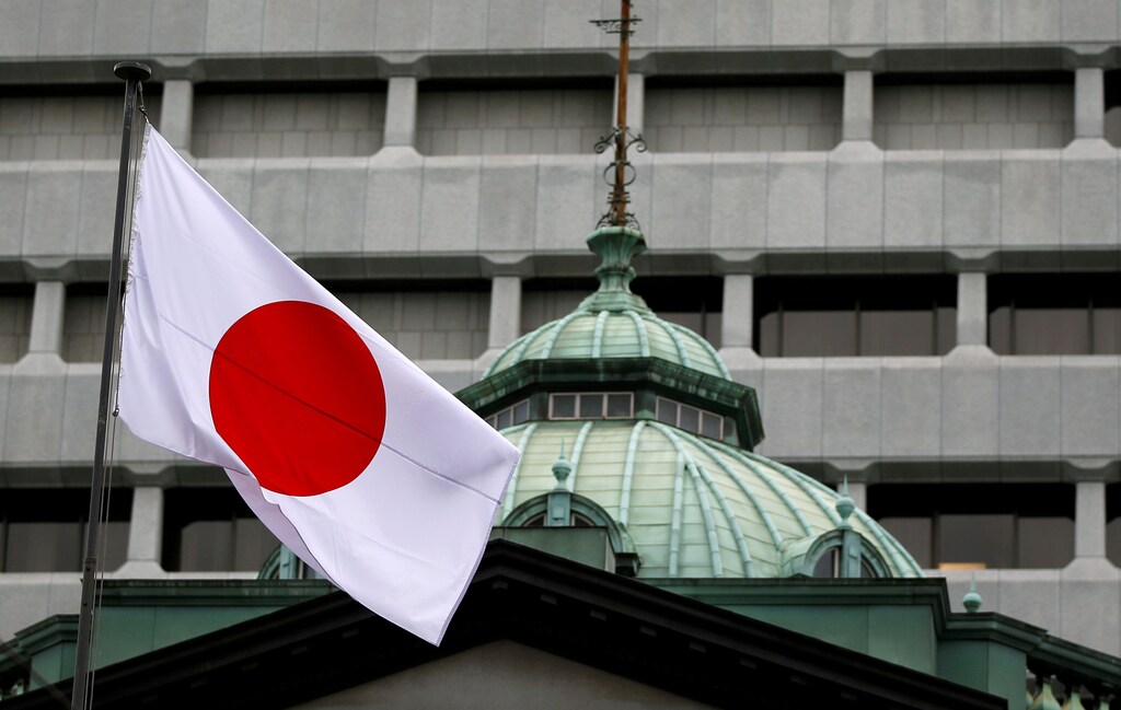 A Japanese flag flutters atop the Bank of Japan building in Tokyo, Japan, September 21, 2016. REUTERS/Toru Hanai/File Photo - RTX2UM36