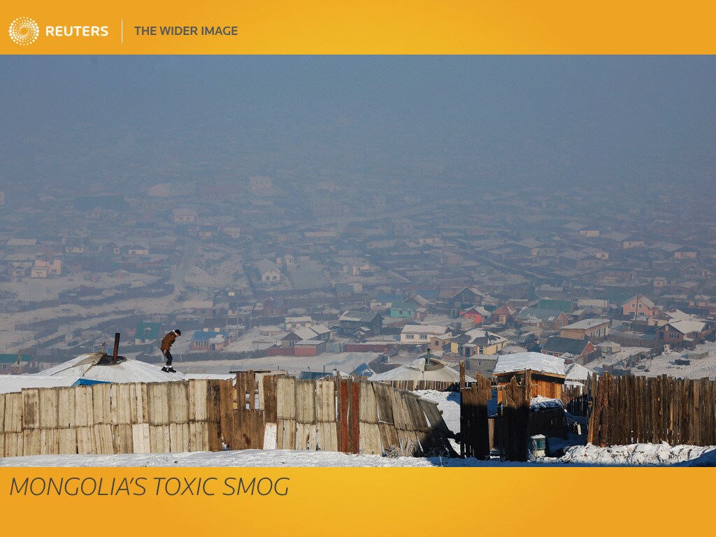 On most winter mornings, Setevdorj Myagmartsogt wakes up to a cloud of toxic smog blanketing his neighbourhood in the Mongolian capital Ulaanbaatar, where the air quality is among the worst in the world. The city's air, which is at times far worse than Beijing's infamous smog, has become more polluted because of smoke from thousands of chimneys burning coal, wood and even trash, as poor residents try to stay warm during brutal winters. REUTERS/B. Rentsendorj SEARCH "RENTSENDORJ POLLUTION" FOR THIS STORY. SEARCH "WIDER IMAGE" FOR ALL STORIES. Matching text MONGOLIA-POLLUTION/ TPX IMAGES OF THE DAY - RTX2ZZXS