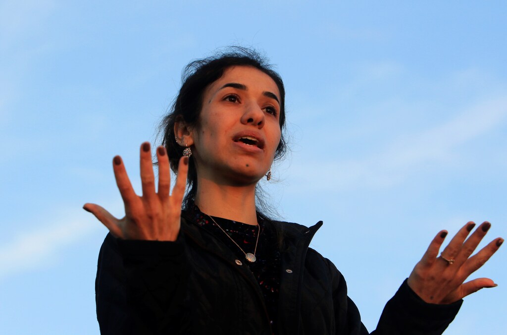 Nobel Peace Prize laureate, Yazidi activist Nadia Murad gestures while talking to the people during her visit to Sinjar, Iraq December 14, 2018. REUTERS/Ari Jalal - RC1178842830