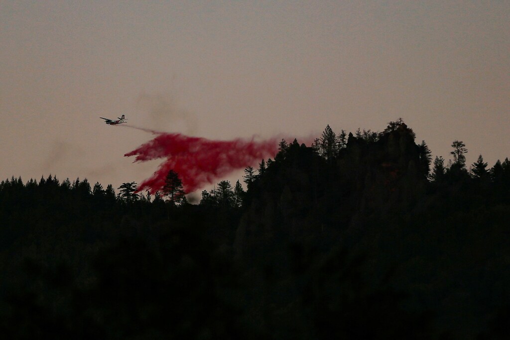 An air tanker makes a retardant drop while battling the Kincade fire near Calistoga, California, U.S. October 29, 2019. REUTERS/Stephen Lam - RC1BC4905950