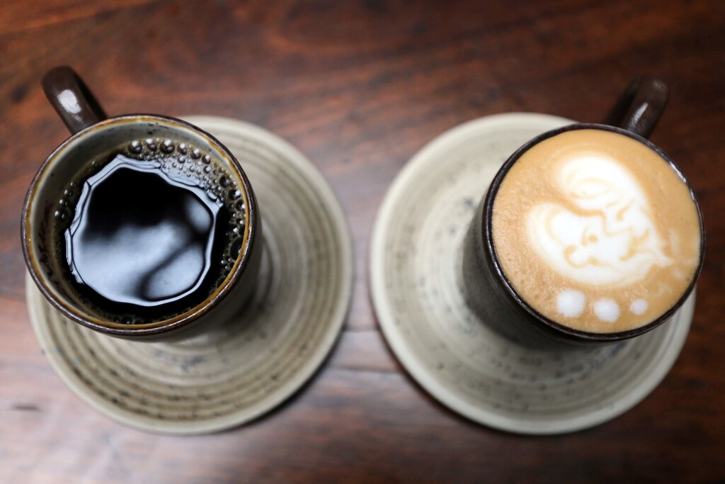 A cup of coffee and a cappuccino are seen at a Juan Valdez store in Bogota, Colombia June 5, 2019. REUTERS/Luisa Gonzalez