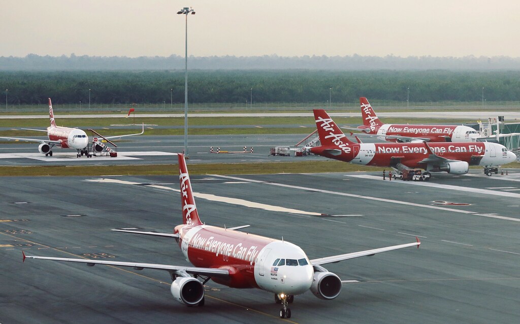 AirAsia planes are seen on the runway at Kuala Lumpur International Airport August 19, 2014.