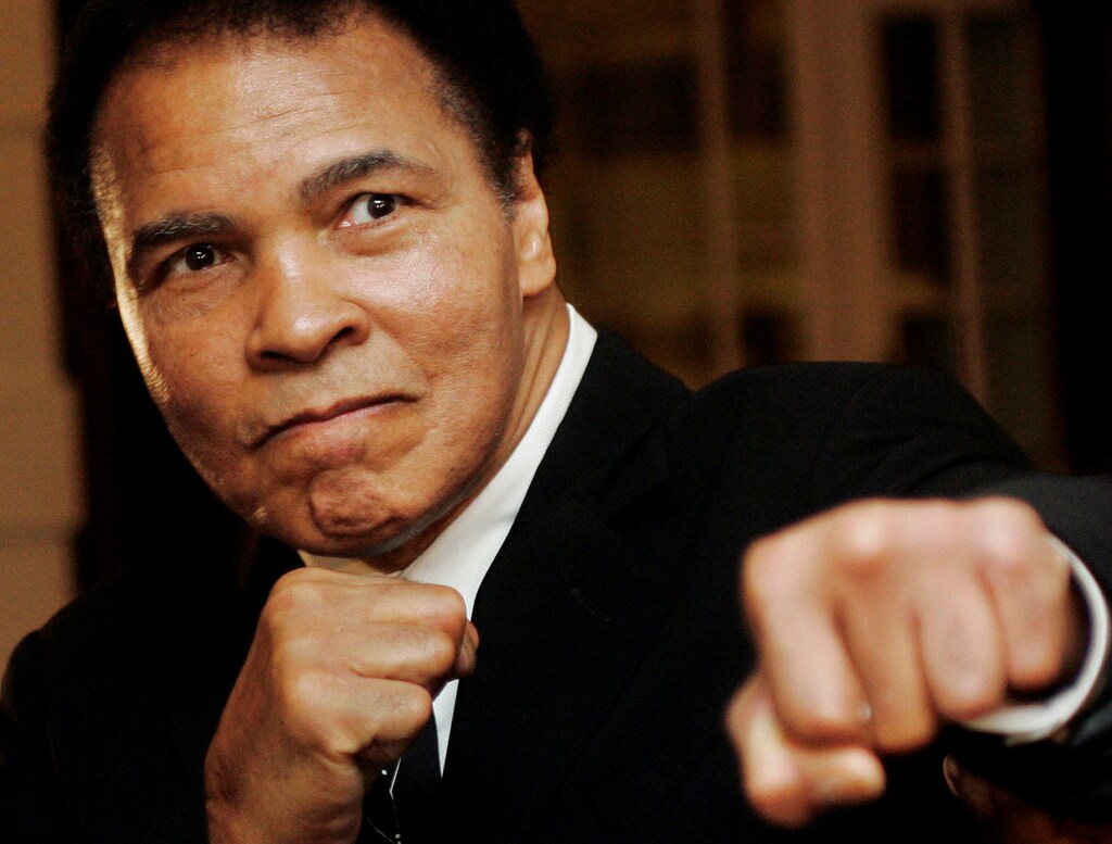 U.S. boxing great Muhammad Ali poses during the Crystal Award ceremony at the World Economic Forum .