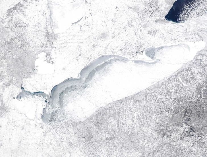 Lake Erie shown in this NASA MODIS (Moderate Resolution Imaging Spectroradiometer) satellite image captured at 1818 GMT (1318 EST) on February 15, 2015 is more than 90% frozen according to the Great Lakes Environmental Research Laboratory. The aftermath of a deadly winter storm paralyzed much of the eastern United States on Tuesday and forecasters warned of the worst cold in two decades from another arctic front this week. Picture taken on February 15, 2015. REUTERS/NASA/Handout (UNITED STATES - Tags: ENVIRONMENT) FOR EDITORIAL USE ONLY. NOT FOR SALE FOR MARKETING OR ADVERTISING CAMPAIGNS. THIS IMAGE HAS BEEN SUPPLIED BY A THIRD PARTY. IT IS DISTRIBUTED, EXACTLY AS RECEIVED BY REUTERS, AS A SERVICE TO CLIENTS