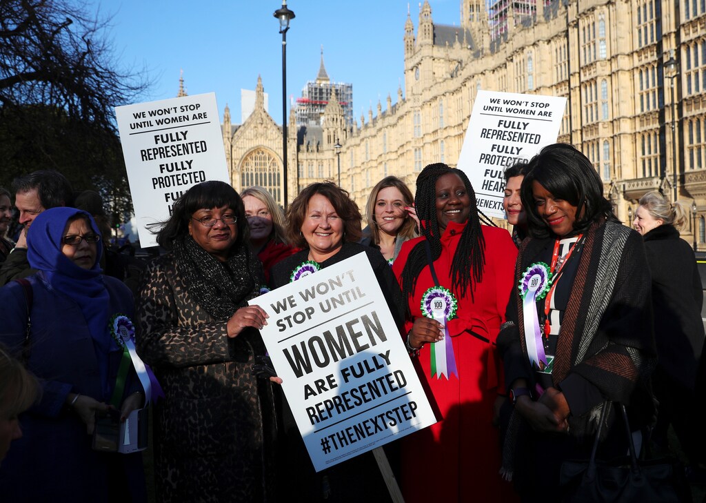 British members of Parliament attend an event to mark the 100th anniversary of the enfranchisment of some, but not all, women